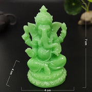 શ્યામ રંગમાં ઝળહળતી ગણેશ પ્રતિમા બુદ્ધ હાથી ભગવાન શિલ્પ પ્રતિમા માનવસર્જિત જેડ સ્ટોન ક્રાફ્ટ હોમ ગાર્ડન ફ્લાવરપોટ ડેકોરેશન